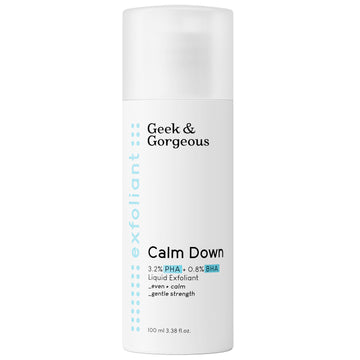 A bottle of full-sized Calm Down exfoliator on white background.