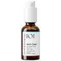 A bottle of AAll Clear serum in front of a white background.