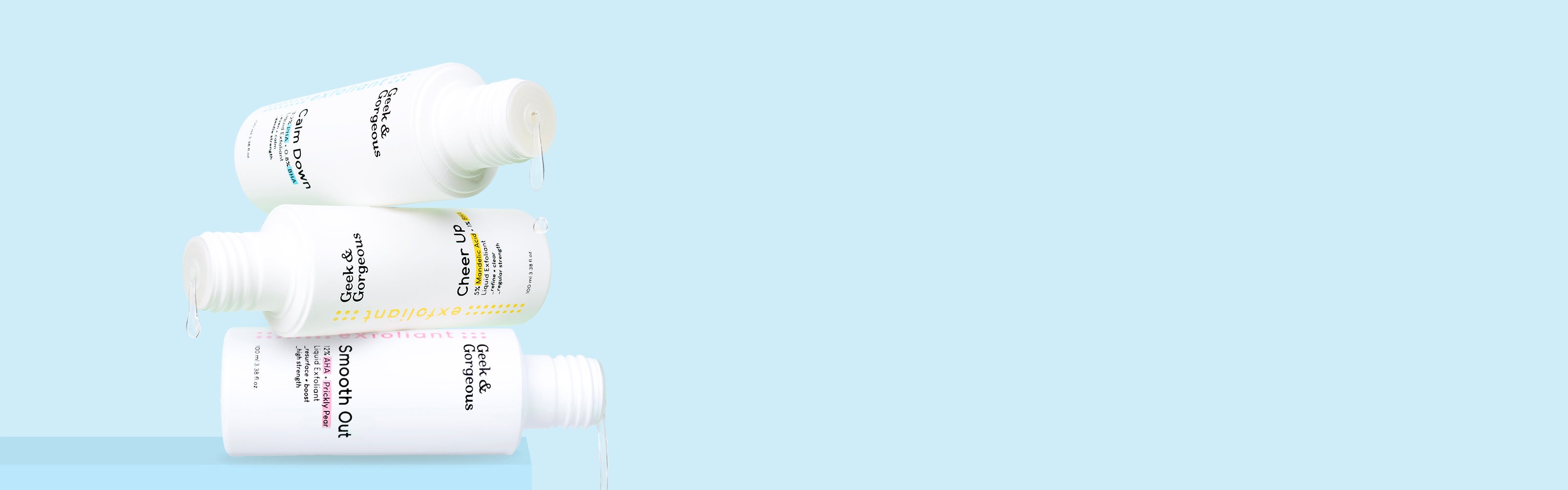 Our three exfoliant bottles stacked on a light blue background. The text on the right side says: geek exfoliants (arrow) gorgeous skin1621243260e1af0c20-0